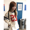 American retro street style long sleeved T shirt for women in autumn new digital embroidery graffiti print casual versatile top